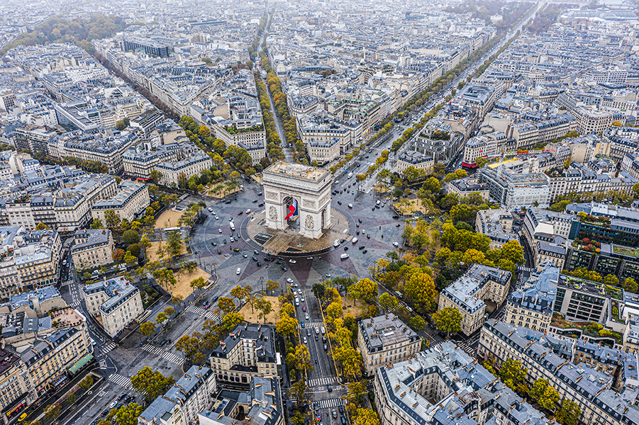 A sky view of the Arc de Triomphe in Paris